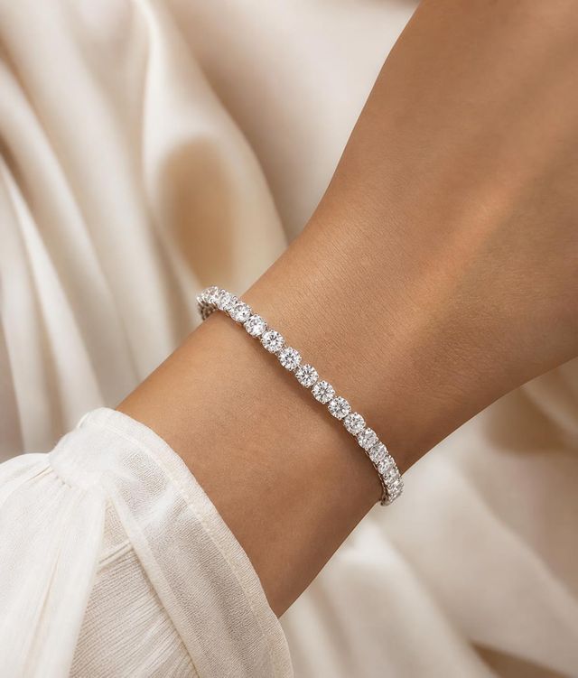 Laboratory-grown diamond tennis bracelet worn on a wrist
