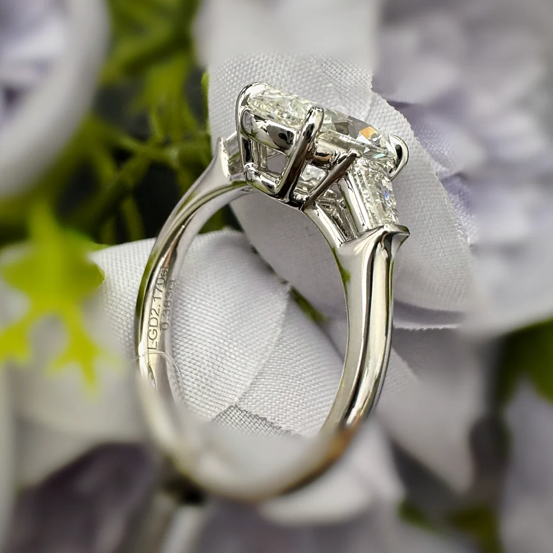 Round Three-Stone with Tapered Baguettes in white gold with laboratory-grown diamonds