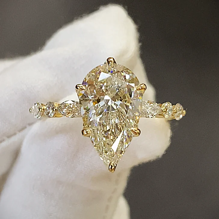 Yellow Pear with Marquise Accents in yellow gold with laboratory-grown diamonds
